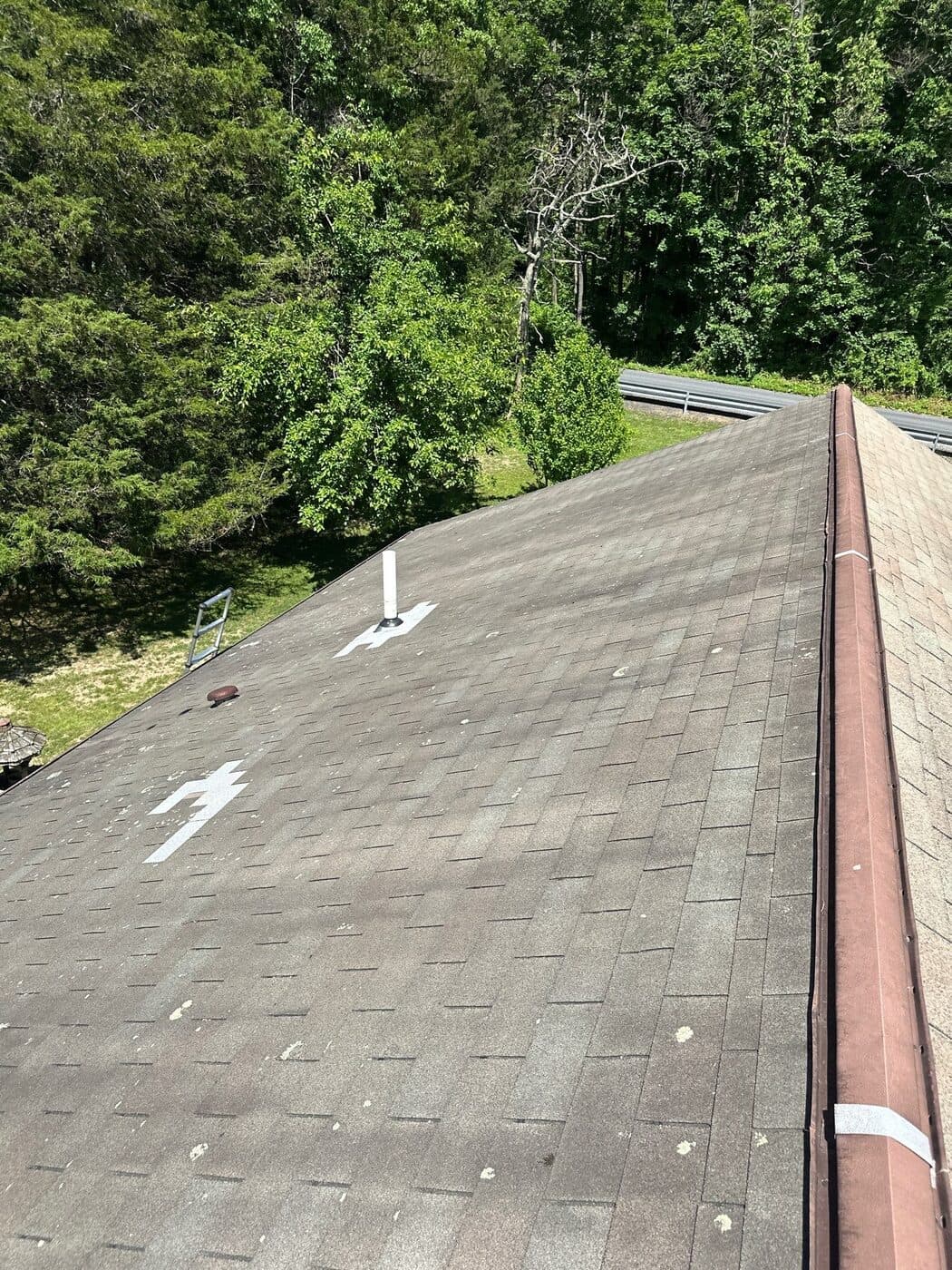 Close roof inspection photo showing roof surface condition on a Poconos home