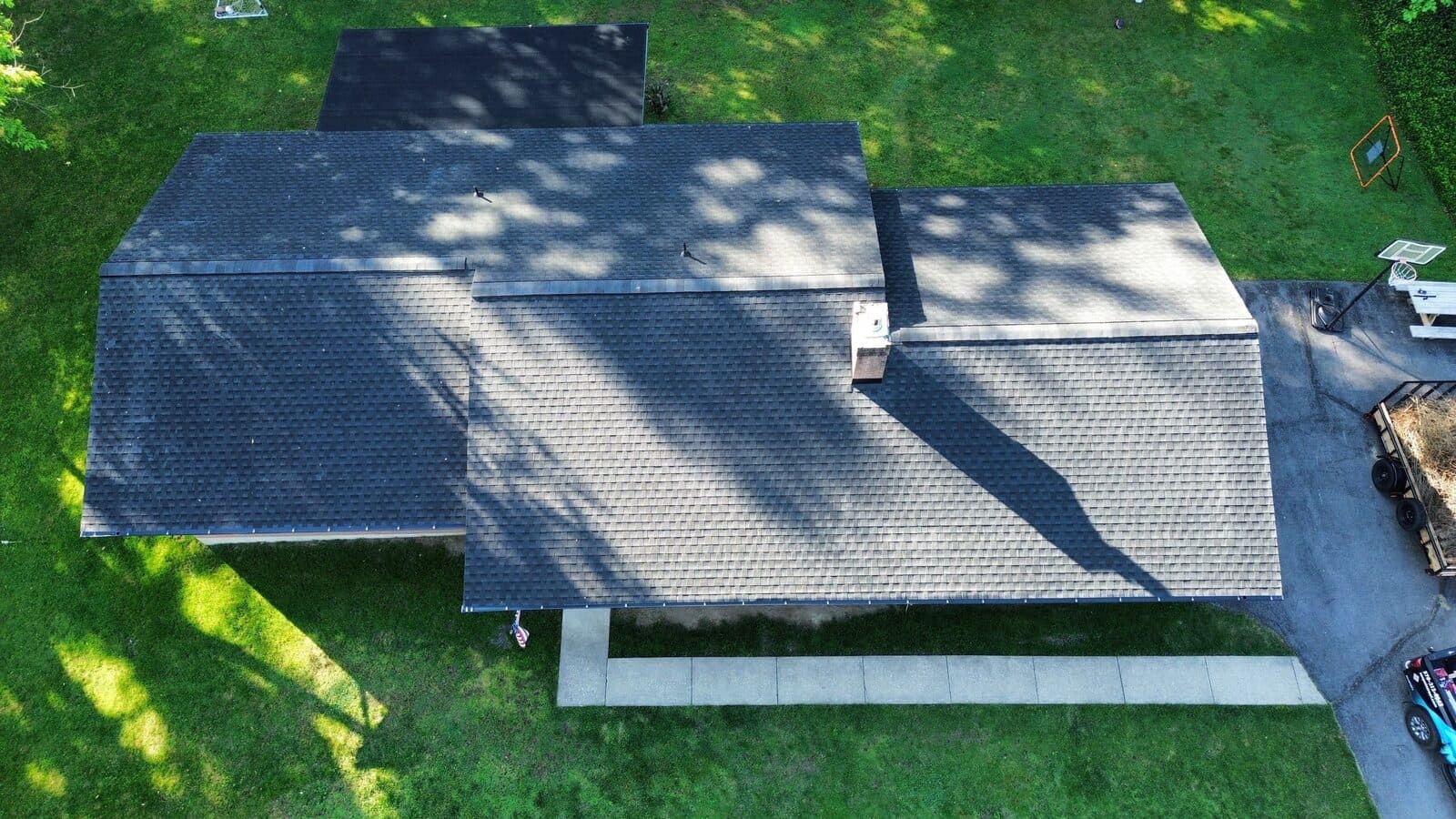 After — Stroudsburg area home roof before replacement and after the completed Ten Point Roofing installation